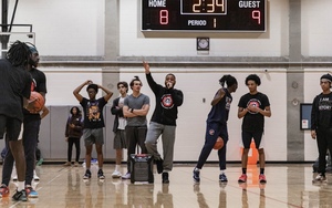  Commentators, players and other members of the crowd watch and cheer on each game in the Black History Month Basketball Classic. The Black History Month Committee hosted the tournament in partnership with the Barnes Center at the Arch.